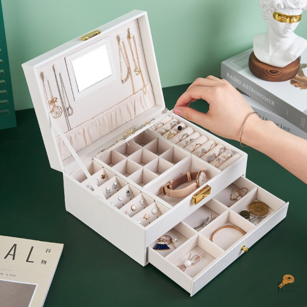 Boîte à bijoux pratique avec compartiments modulables