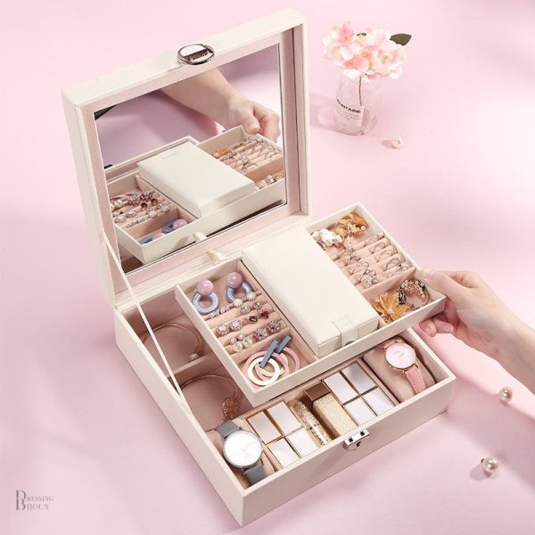 Boîte à bijoux avec finition miroir, design chic et fonctionnel